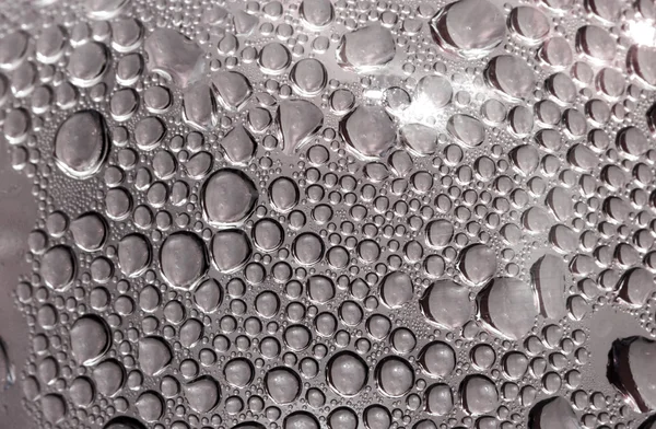 Gotas no fundo de vidro — Fotografia de Stock