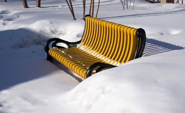 Bench in the snow in the winter — Stock Photo, Image