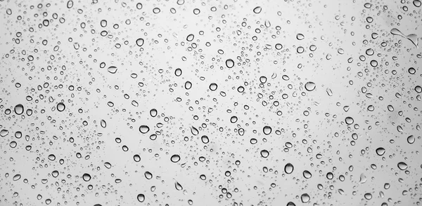 Raindrops on window glass — Stock Photo, Image