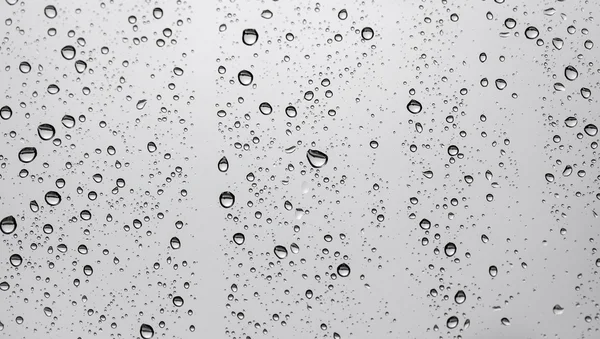 Raindrops on window glass — Stock Photo, Image