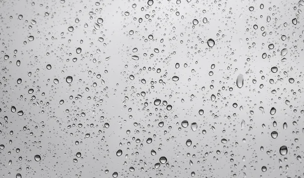 Raindrops on window glass — Stock Photo, Image