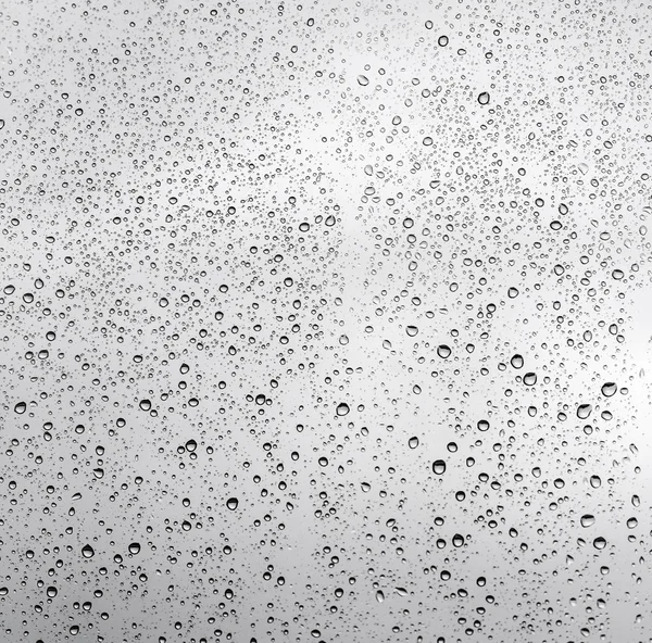 Gotas de chuva no vidro da janela — Fotografia de Stock