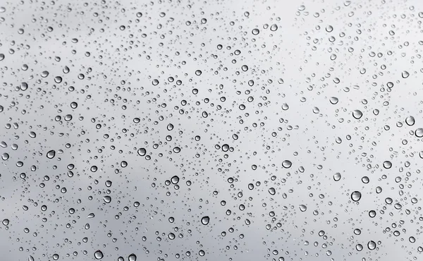 Σταγόνες βροχής στο τζάμι του παραθύρου — Φωτογραφία Αρχείου
