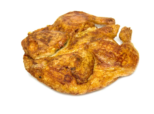 Жареный цыпленок на тарелке — стоковое фото