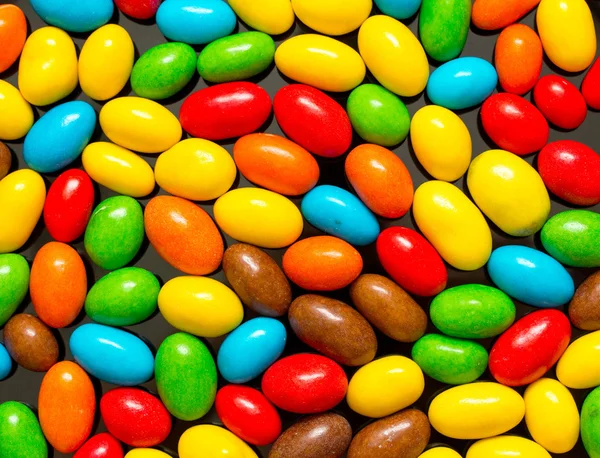 Kupac színes cukorkák — Stock Fotó