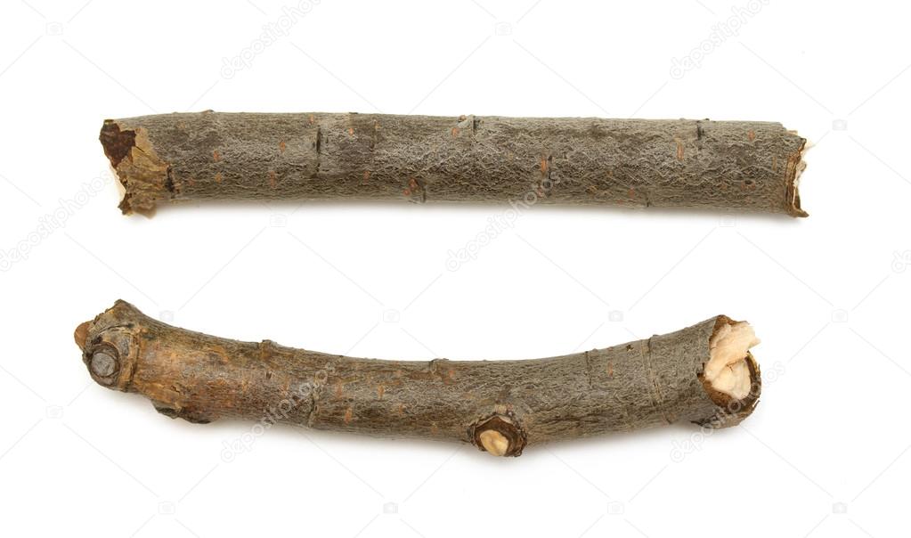 Wooden sticks on a white