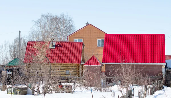 Casa nel villaggio inverno — Foto Stock