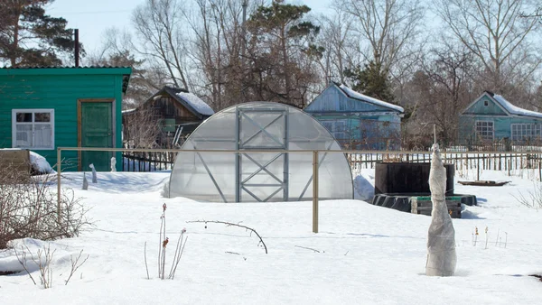 Plastic hothouse in winter — Stock Photo, Image