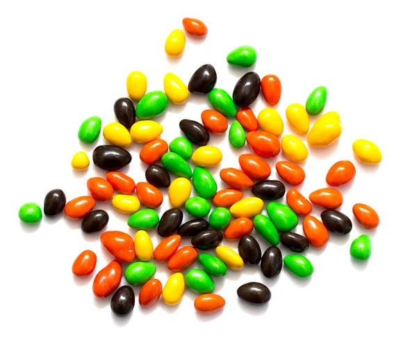 Kolorowe cukierki na biały — Zdjęcie stockowe