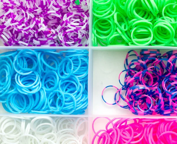Rubber bands on a white — Stock Photo, Image