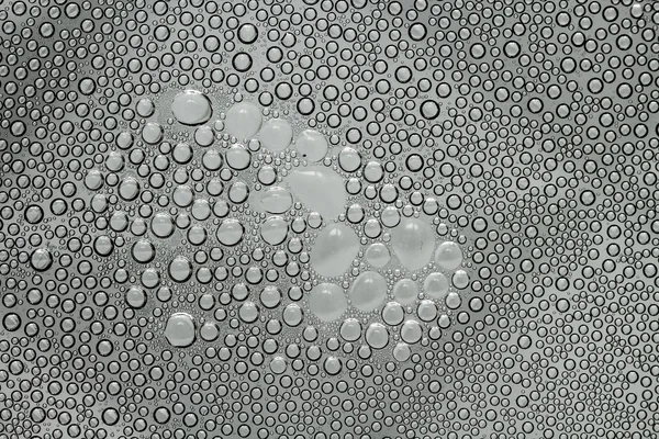 Su damlacıkları ile cam — Stok fotoğraf
