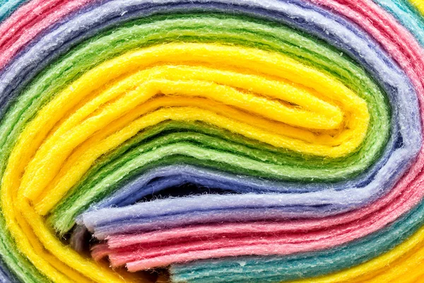 Frottee-Handtücher in verschiedenen Farben Hintergrund — Stockfoto