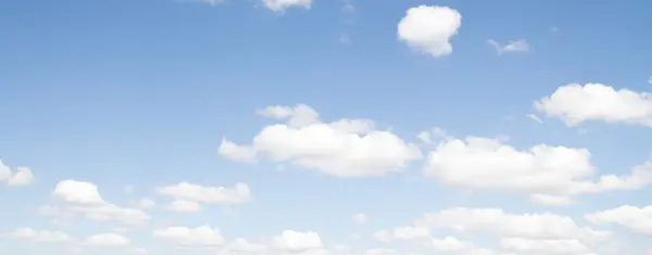 Clouds on a blue sky day — Stock Photo, Image