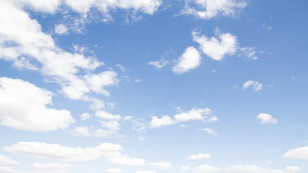 Clouds on a blue sky day — Stock Photo, Image