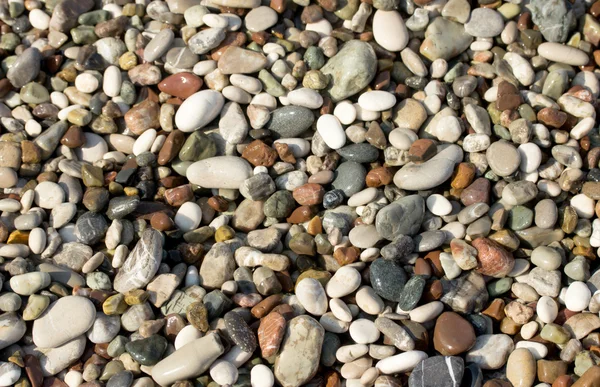 Фон из гальки на пляже — стоковое фото