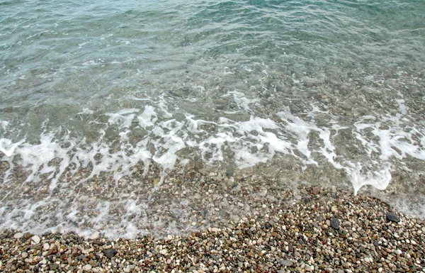 浜辺の波の泡. — ストック写真
