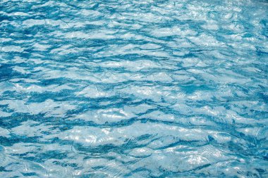 background of blue sea water in sunny weather nature.