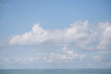 Sky background with clouds. White clouds against a blue sky.