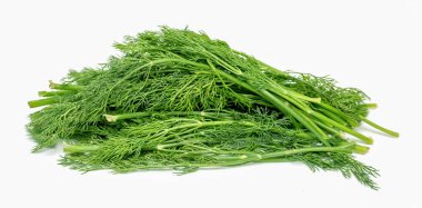 A bunch of green herbs are piled on top of each other. The herbs are fresh and green, and they look like they are ready to be used in a recipe