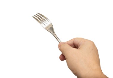 Beyaz arka planı olan bir çatalı tutan bir el. Çatal bükülür ve kişinin eli onu tutar.