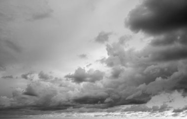 Clouds against the sky, black and white.