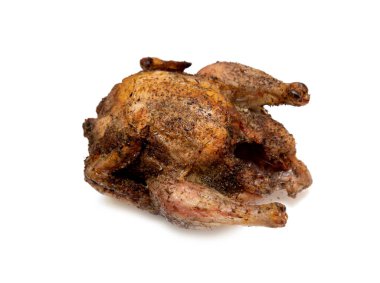 A roasted chicken with a lot of seasoning on it. The seasoning is a mix of salt and pepper