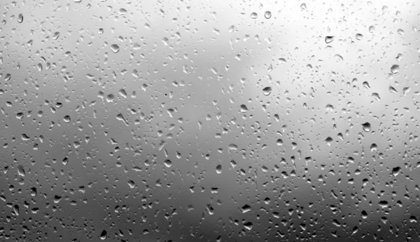 Gocce di pioggia sul vetro — Foto Stock