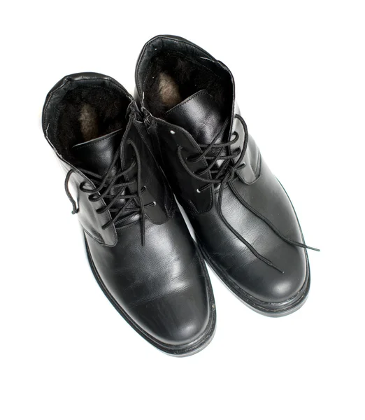 Bottes en cuir noir pour hommes sur fond blanc — Photo