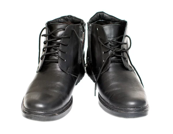 Botas de couro preto dos homens em um fundo branco — Fotografia de Stock