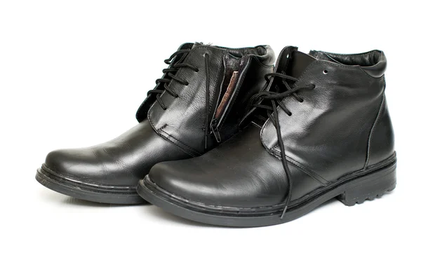 Botas de cuero negro para hombre sobre fondo blanco —  Fotos de Stock