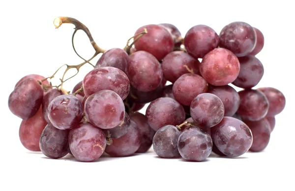 Um monte de uvas em um fundo branco — Fotografia de Stock