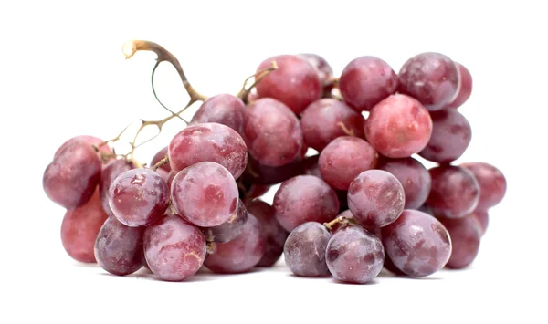 Um monte de uvas em um fundo branco — Fotografia de Stock