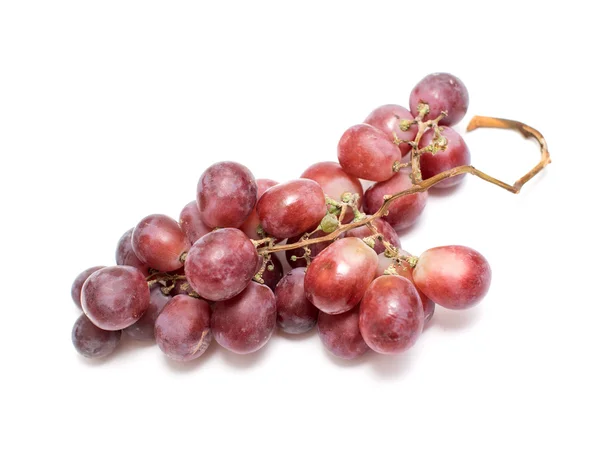 Um monte de uvas em um fundo branco — Fotografia de Stock