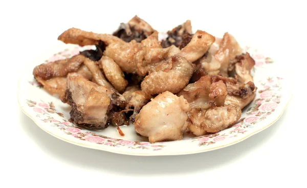 Stukjes gebakken kip op een bord — Stockfoto