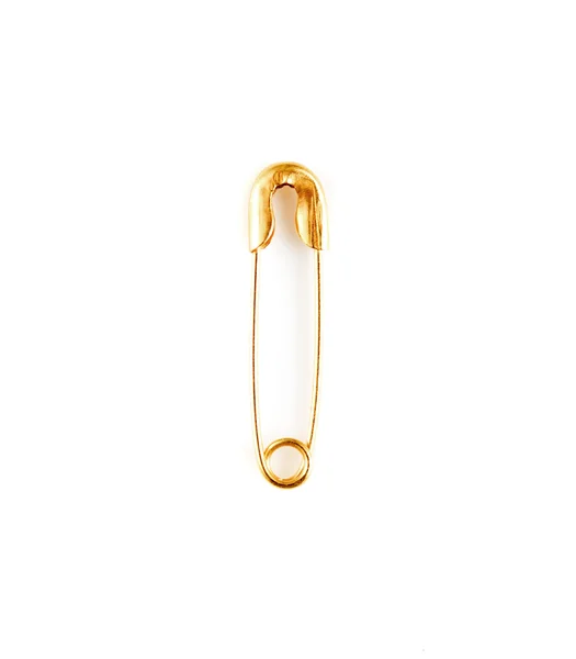 Gold pin on a white background — Stock Photo, Image