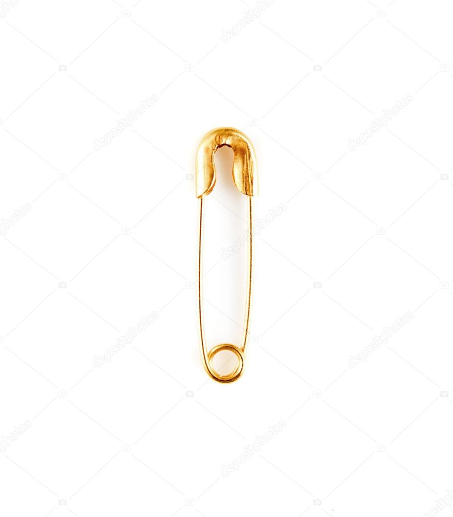 gold pin on a white background