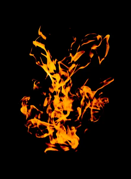 Flăcări de foc pe un fundal negru — Fotografie, imagine de stoc