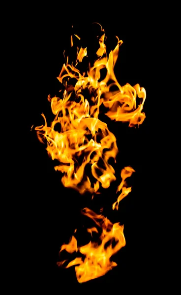 Fiamme di fuoco su uno sfondo nero — Foto Stock