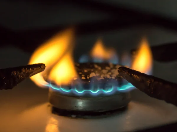 Gas burner on stove. Selective focus. — Stock Photo, Image