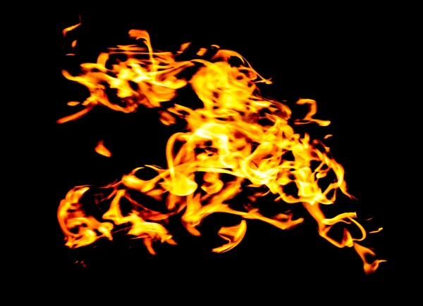 Fiamme di fuoco su un nero — Foto Stock