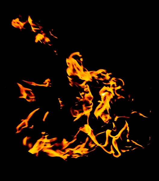 Llamas de fuego en un negro —  Fotos de Stock