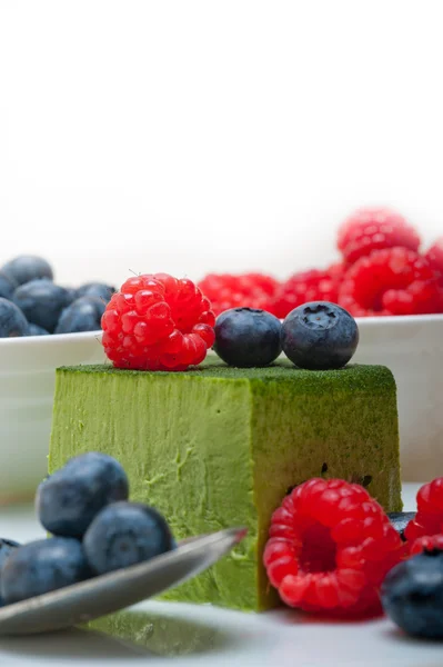 Green tea matcha mousse cake with berries — Stock Photo, Image