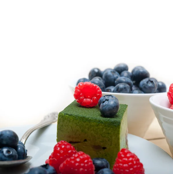 Green tea matcha mousse cake with berries — Stock Photo, Image