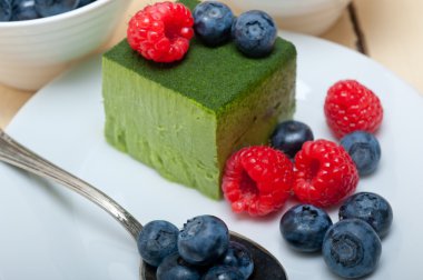 green tea matcha mousse cake with berries clipart