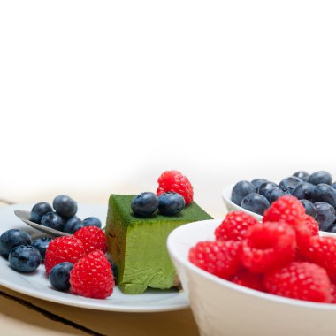 green tea matcha mousse cake with berries clipart
