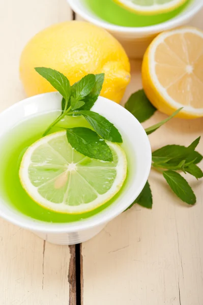 Mint infusion tea tisane with lemon — Stock Photo, Image