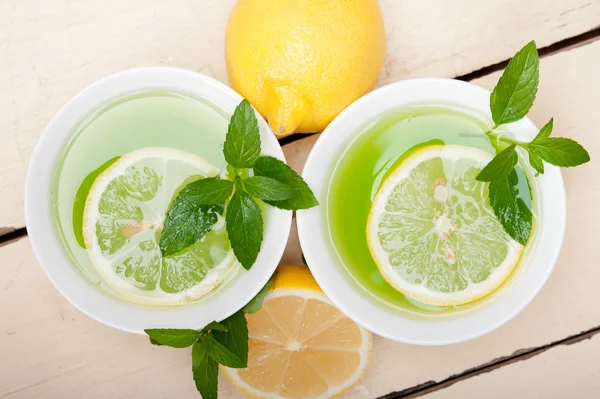 Mint infusion tea tisane with lemon — Stock Photo, Image