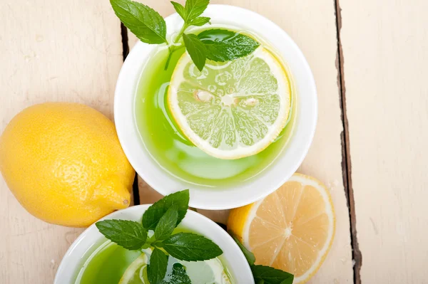 Mint infusion tea tisane with lemon — Stock Photo, Image