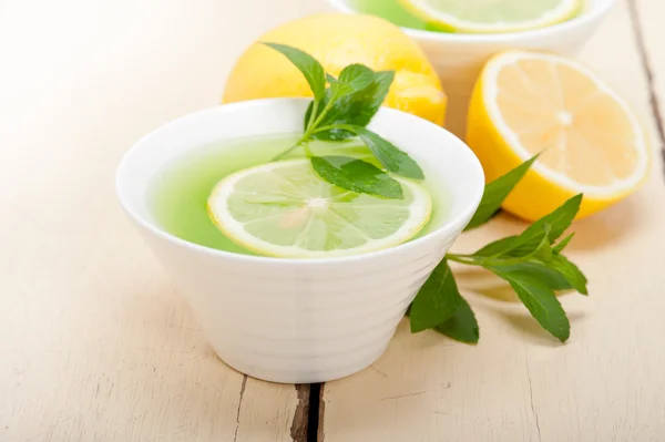 Mint infusion tea tisane with lemon — Stock Photo, Image