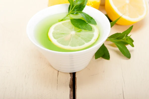 Mint infusion tea tisane with lemon — Stock Photo, Image